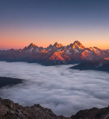 Golden Mountain Sunrise Over Cloud-Filled Valley