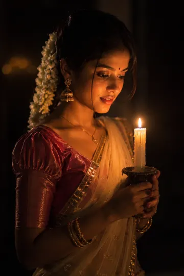 Candlelight Beauty – Traditional Half Saree Girl in Warm Glow | 4K Wallpaper