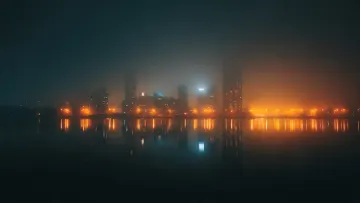 Foggy City Skyline Night Desktop Wallpaper | Misty Golden Lights 4K